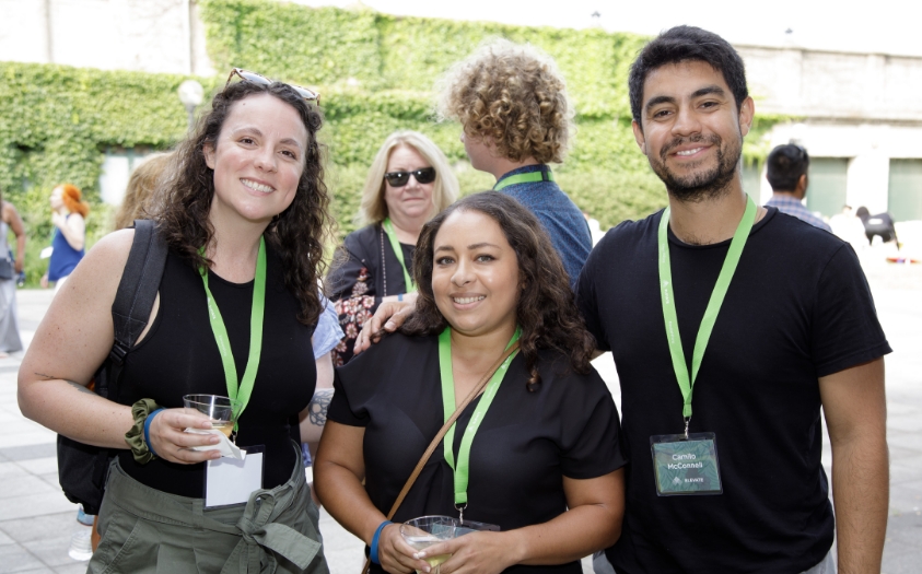 Group of Elevate employees standing outside at an event