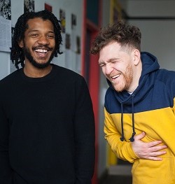 Two men laughing