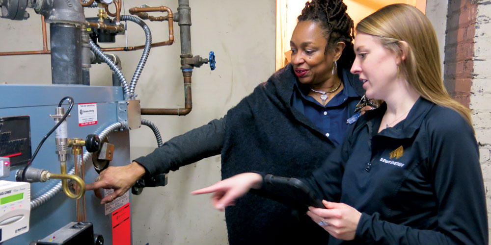 Marcia Ellis showing Carrie Donohoe a Boiler 