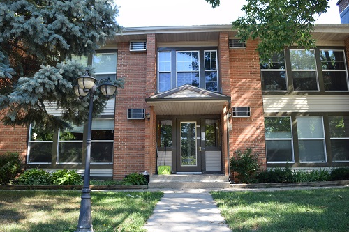 Exterior of red brick multifamily building in Wisconsin