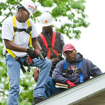 men working on roof