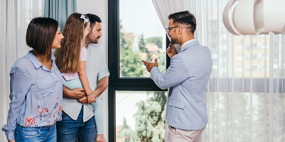 professional showing home to a family 